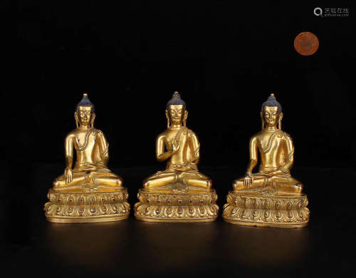 A SET OF TIBETAN BRONZE GILT SAMBO BUDDHA STATUES,  MING REGIN