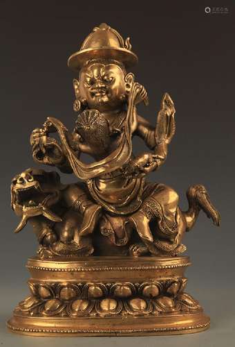 A FINELY CARVED TIBETAN STATUE