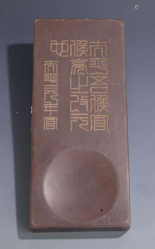 A FINELY CARVED STONE INK