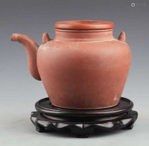 A FINELY CARVED ZISHA TEAPOT