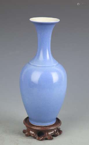 A SKY BLUE COLOR GLAZED GUAN YIN STYLE VASE