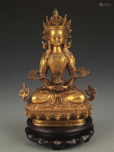 A FINELY CARVED TIBETAN BUDDHA