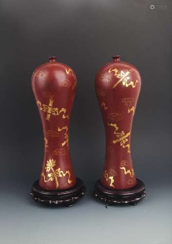 PAIR OF TALL WOOD GILT-LACQUERED WOOD BOTTLE