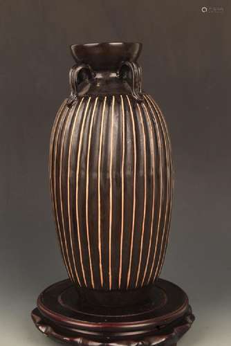 A BLACK COLOR GLAZED PORCELAIN BOTTLE