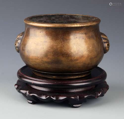 A ROUND DOUBLE EAR BRONZE CENSER