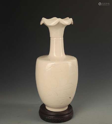 A DING KILN LOTUS PATTERN FLOWER TOP VASE