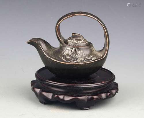 A FINELY CARVED ZISHA TEAPOT