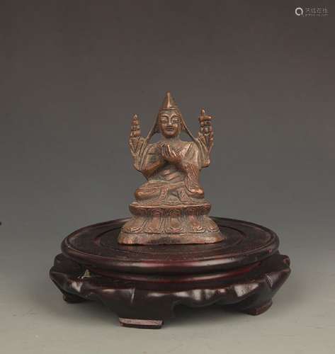 A SMALL BRONZE BUDDHA FIGURE