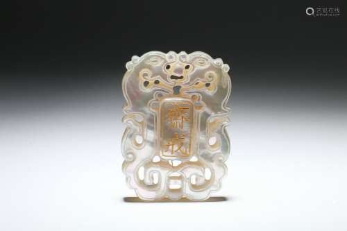 A Chinese Carved Mother of Pearl Fasting Pendant