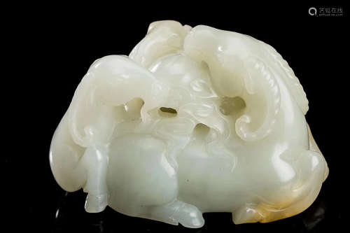 A HEITIAN WHITE JADE HOLLOW-OUT PAPERWEIGHT ORNAMENT