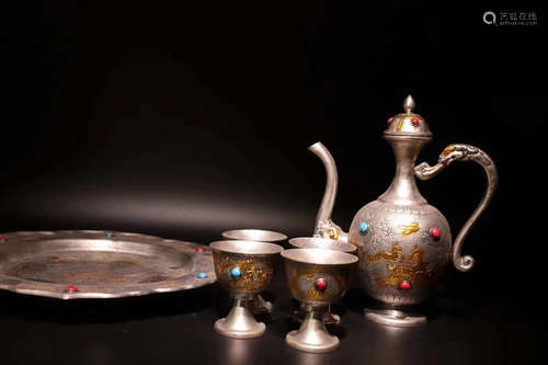 A SET OF SILVER WINE SET