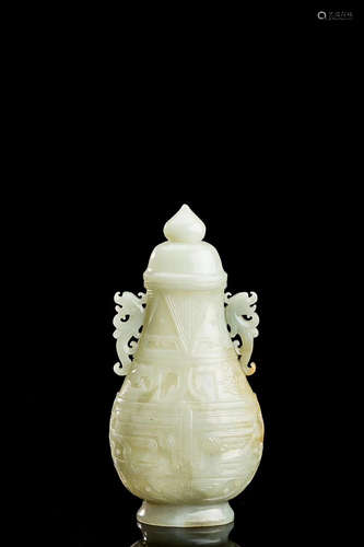 A HETIAN LIGHT GREENISH WHITE JADE VASE WITH CAP