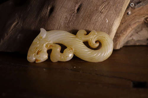 A OLD HETIAN JADE GARGON SHAPE HAND PIECE.