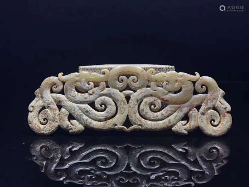 A ZHANHAN DOUBLE-DRAGON DESIGN PIERCING HEITIAN JADE