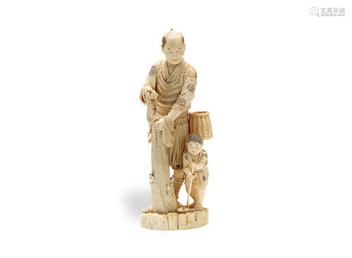 Meiji Period A large ivory okimono of a fisherman