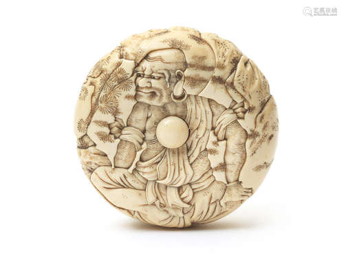 Edo Period An ivory manju netsuke of a rakkan