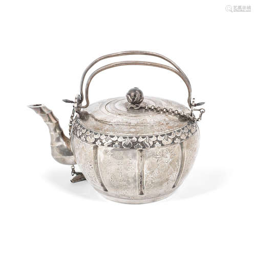 Late 19th century A Chinese export silver teapot and cover