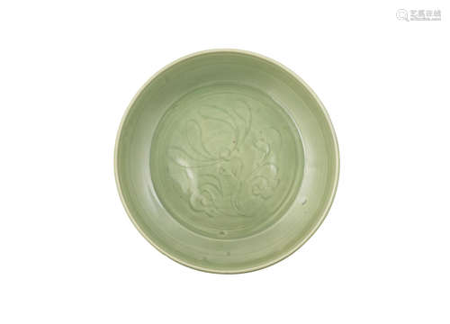 15th century A large carved Longquan celadon-glazed 'lotus' dish