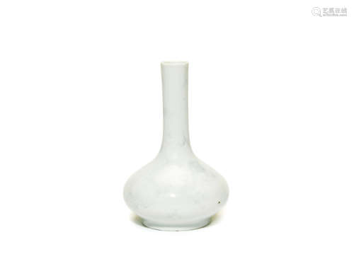 Qing Dynasty An anhua white-glazed 'dragon' bottle vase