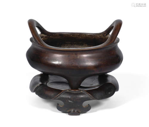 Xuande four-character mark, Qing Dynasty A bronze tripod incense burner and stand