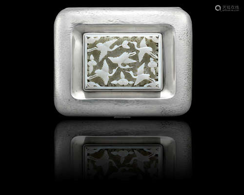 The jade Ming Dynasty A mounted pale green jade reticulated 'cranes' plaque