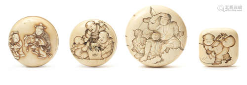 19th century, Edo/Meiji Period A group of four ivory manju netsuke