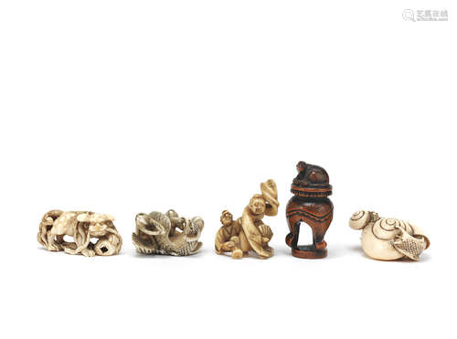 Meiji/Taisho Period A group of twelve ivory and one wood netsuke