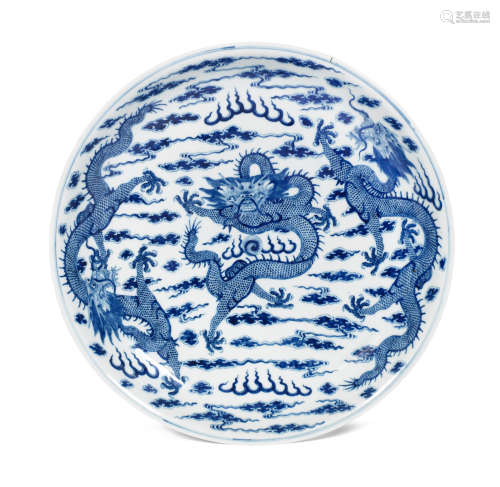 Kangxi six-character mark, Guangxu A blue and white 'dragon' dish