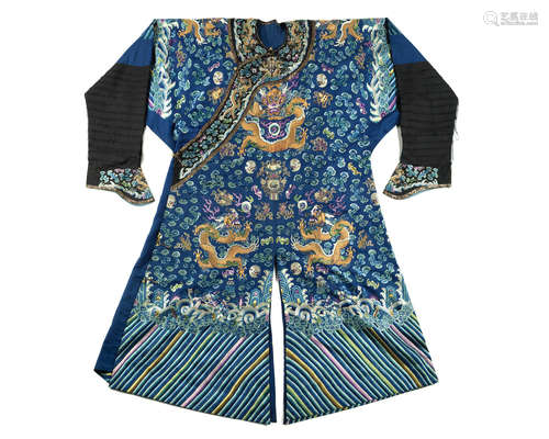 19th century A blue-ground silk embroidered 'nine dragon' robe