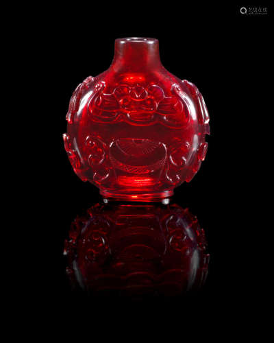 18th/19th century A fine red glass 'Eight Buddhist Emblems' snuff bottle