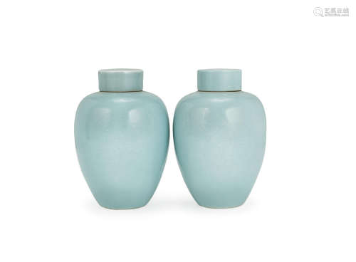 Kangxi six-character marks, Republic Period A pair of clair-de-lune glazed oviform jars and covers