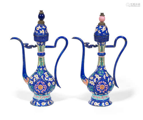 18th/19th century A pair of painted enamel 'islamic-style' ewers and covers