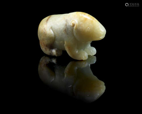 Ming Dynasty A mottled green and russet jade carving of a bear