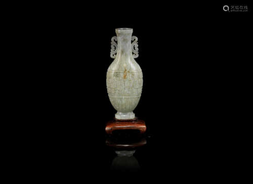 18th century A small mottled green jade archaistic vase