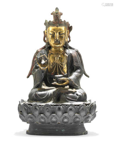 16th/17th century A parcel-gilt bronze figure of Guanyin
