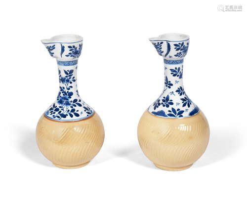 Kangxi A pair of unusual blue and white and cafe-au-lait glazed ewers