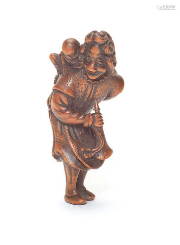 Edo Period A wood netsuke of a Dutchman