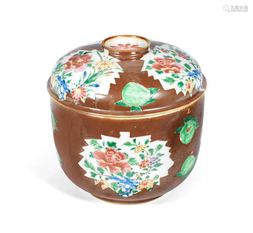 Qianlong A brown-ground famille rose 'Batavian' jar and cover