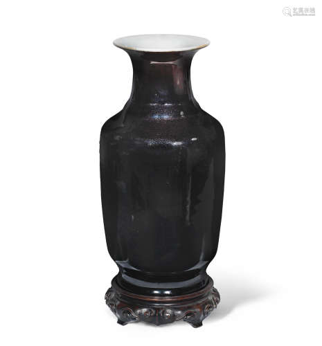 19th century A mirror black-glazed baluster vase