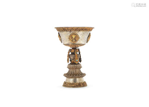 Tibet, 19th century  A parcel-gilt silver butter lamp