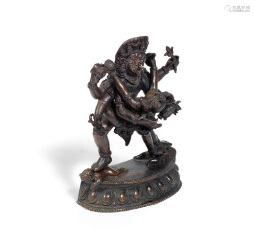 Probably 18th century A bronze figure of a wrathful Buddhist deity and consort