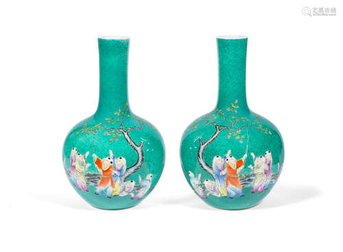 Qing Dynasty A pair of turquoise-ground famille rose bottle vases