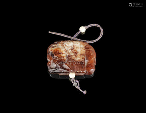 17th century A cream and brown jade 'elephant' pendant