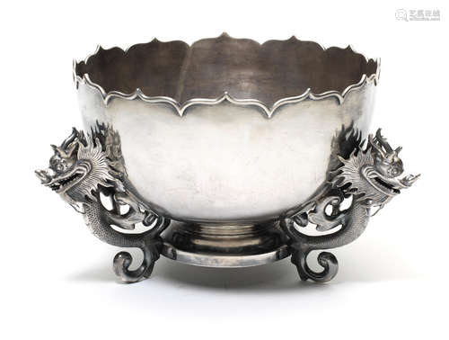 Wang Hing stamped mark, Late 19th century A Chinese export silver 'dragon' tripod bowl