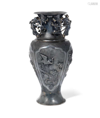 19th/20th century  A silver repoussé baluster vase