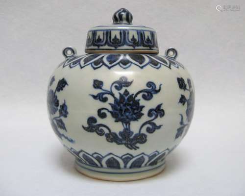 A BLUE AND WHITE POT WITH COVER