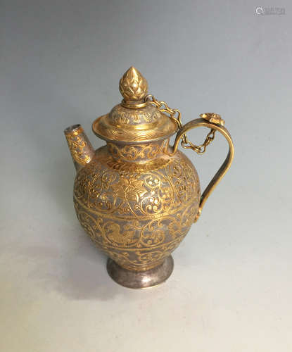 A GILT SILVER EWER