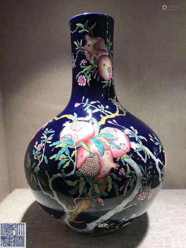 A QIANLONG MARK FAMILLE-ROSE BLUE BOTTLE VASE