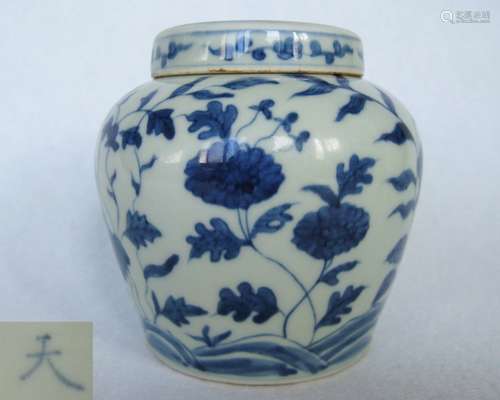 A BLUE AND WHITE COVERED JAR WITH TIAN MARK