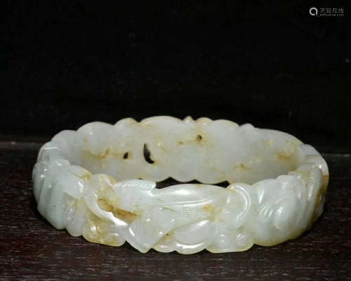 A HETIAN JADE DRAGON BANGLE